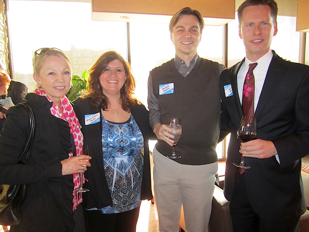 From left, Vicki Baumgartner (7), and Moxley Carmichael's Shaun Fulco, Michael Higdon (3), and Moxley Carmichael's Scott Bird.