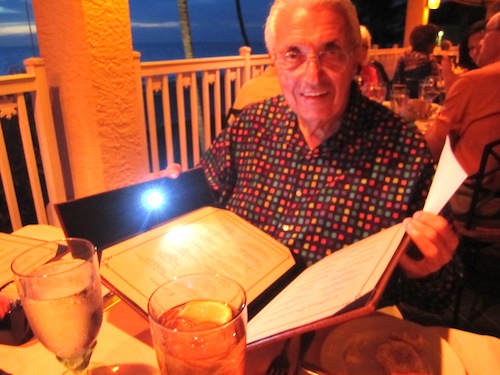 Bobby with a lighted menu at La Playa Beach Club on Vanderbilt Beach, 2012.