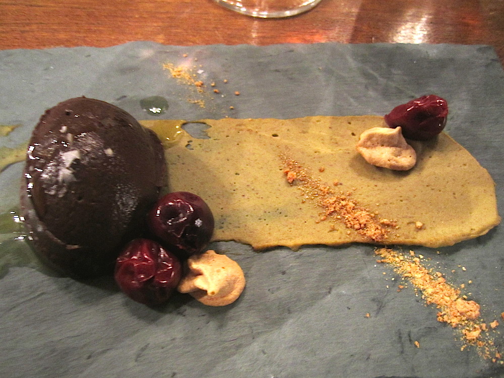 Finale was dark chocolate cremeux, pistachio, pickled cherries, malted meringe, sea salt and olive oil. Spectacular deep cocoa flavor complimented by all the rest.