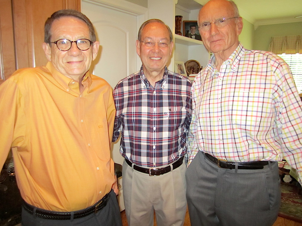 Xxxxx Xxxxx, left, chatted with Chancellor Cheek and Jim Haslam in the kitchen.