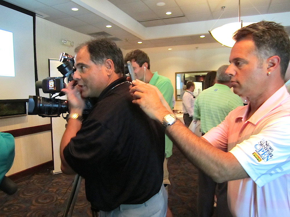 Rick Russo, left, of WVLT-TV, and Dino Cartwright, the public relations director for the golf tourney.