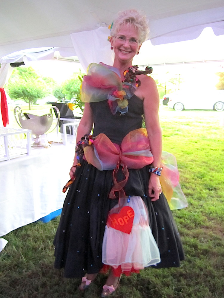 Susan Arbital dresses to match the party invitation every year! Clever.