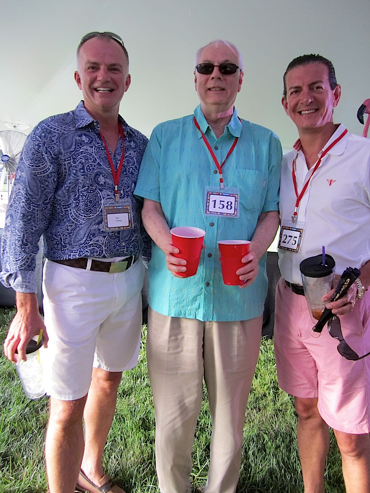 From left, Tim Young, Alan Carmichael and Jeff Cupp enjoying the silent auction.