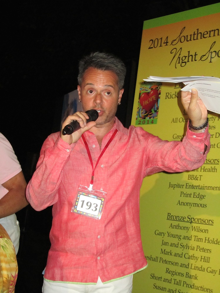 The evening's emcee, Dino Cartwright, introducing the auction part of the evening.