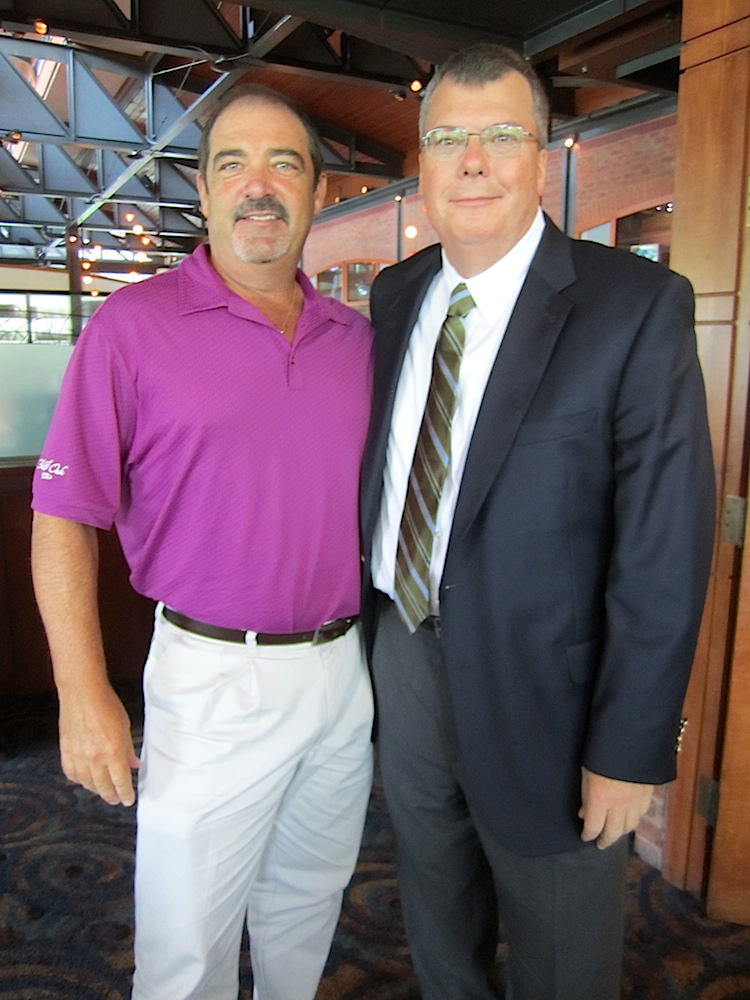 News Sentinel publisher Patrick Birmingham, right, with golfer Ben Bates, who has played in 18 of the Knoxville professional golf tourneys, including the first in 1990.