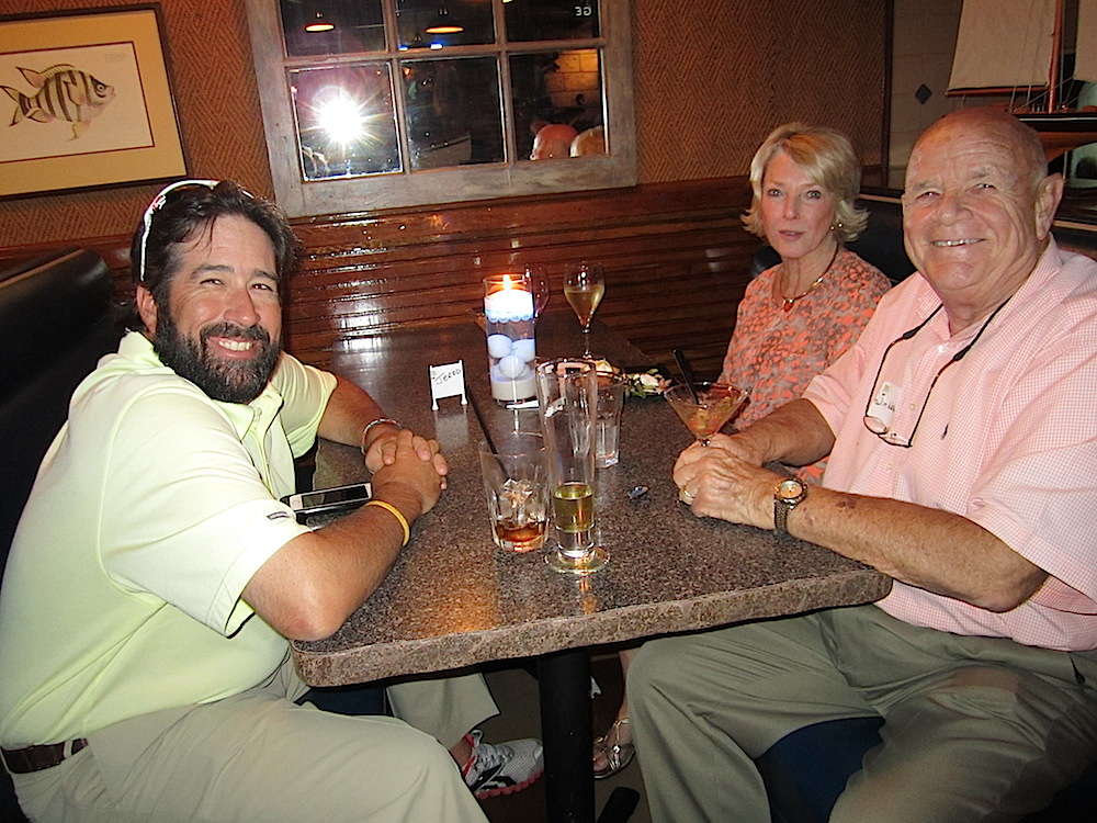 Pro golfer Jarod Turner, left, with Neala and Jim Wakefield.