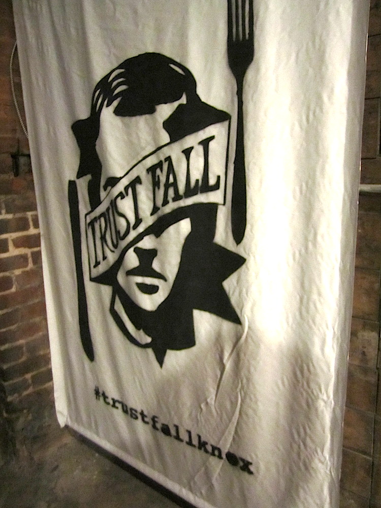 The folks at The Village designed the logo for Trust Fall.