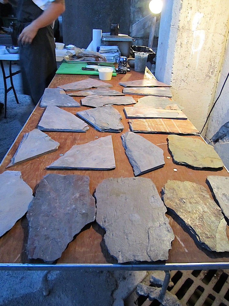 The first course would be served on these pieces of slate. Very cool.