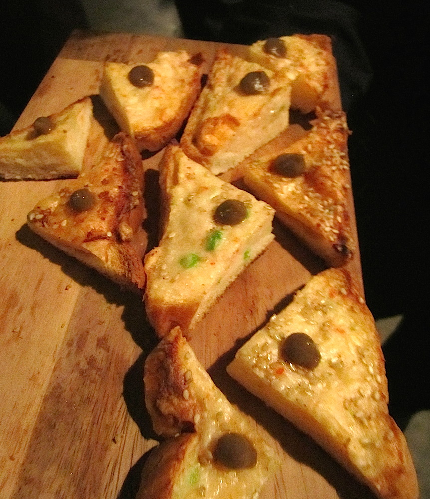 Shrimp toast with capers.