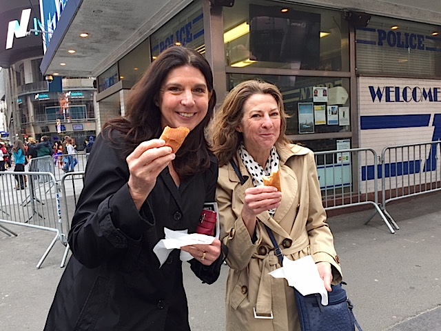 And what's a trip to NYC without a little street food? Here are sisters Liz Stowers, left, and Patrice Shallow sampling some of the edible wares. (Photo by David Byrd)