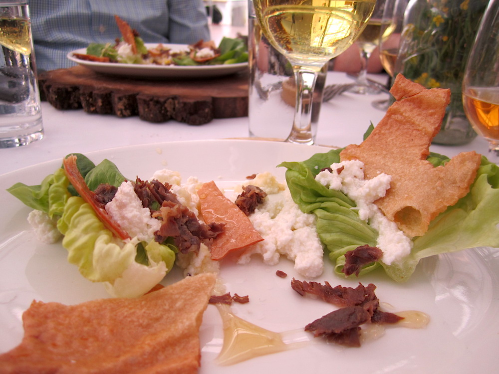 The salad course featured red curry lamb prosciutto with homemade ricotta, deer tongue greens and honey comb. It was paired with a 2010 Melville Estate Viognier-Verna's.