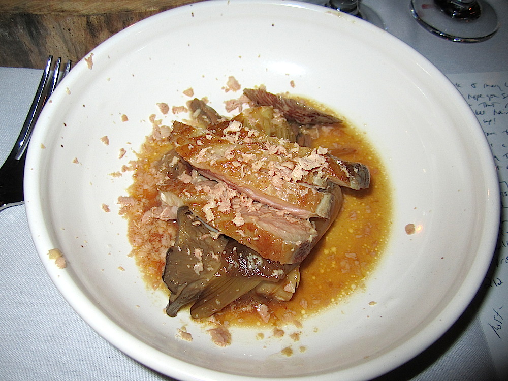 Roasted duck breast with melted spring onions and duck tongues with foie gras and confit mushrooms.