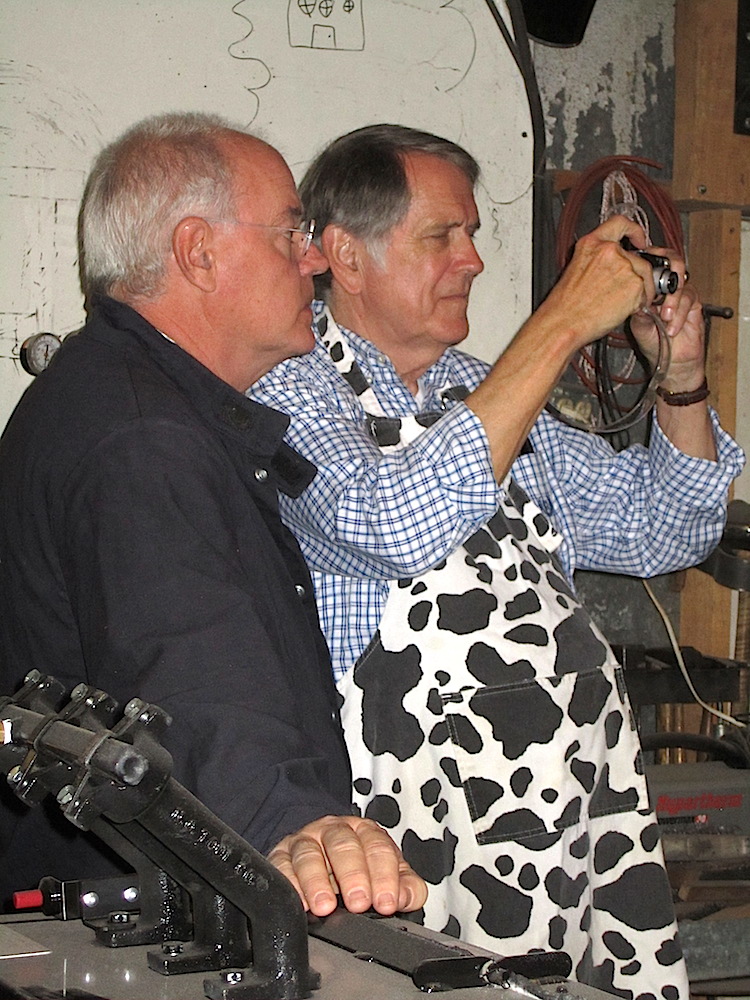 How many men does it take to take a picture? (Don't you love Duane's apron?)