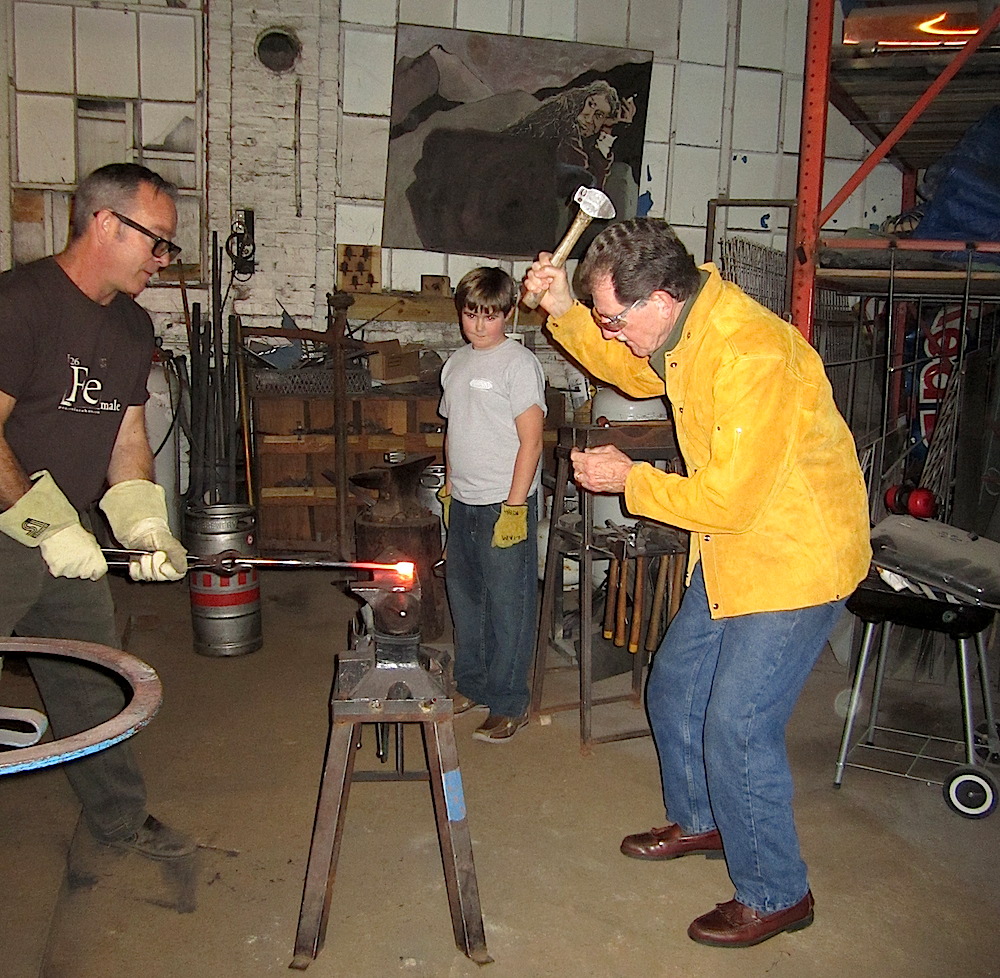 Lawyer John Eldridge took a turn at molding the hot iron.