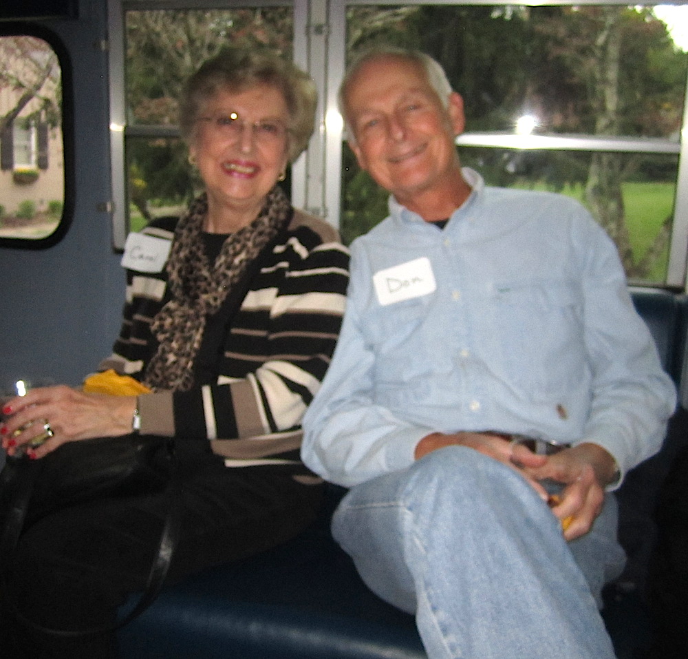 Carol and Don Parnell settled in and the hosts passed around wine and a platter of cheese and crackers.