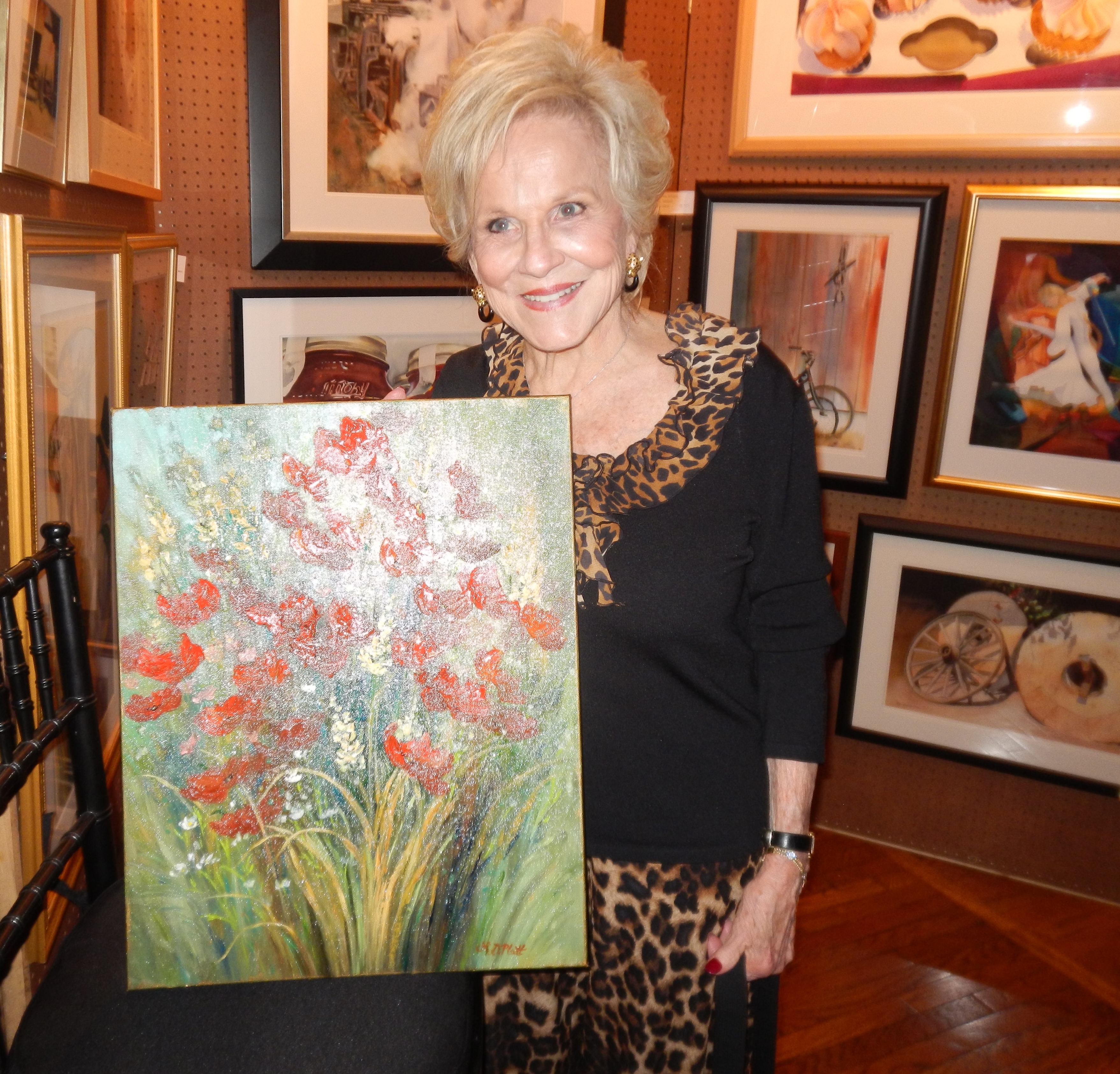 Janet Testerman Crossley purchased this painting of red poppies by Leila Platt.