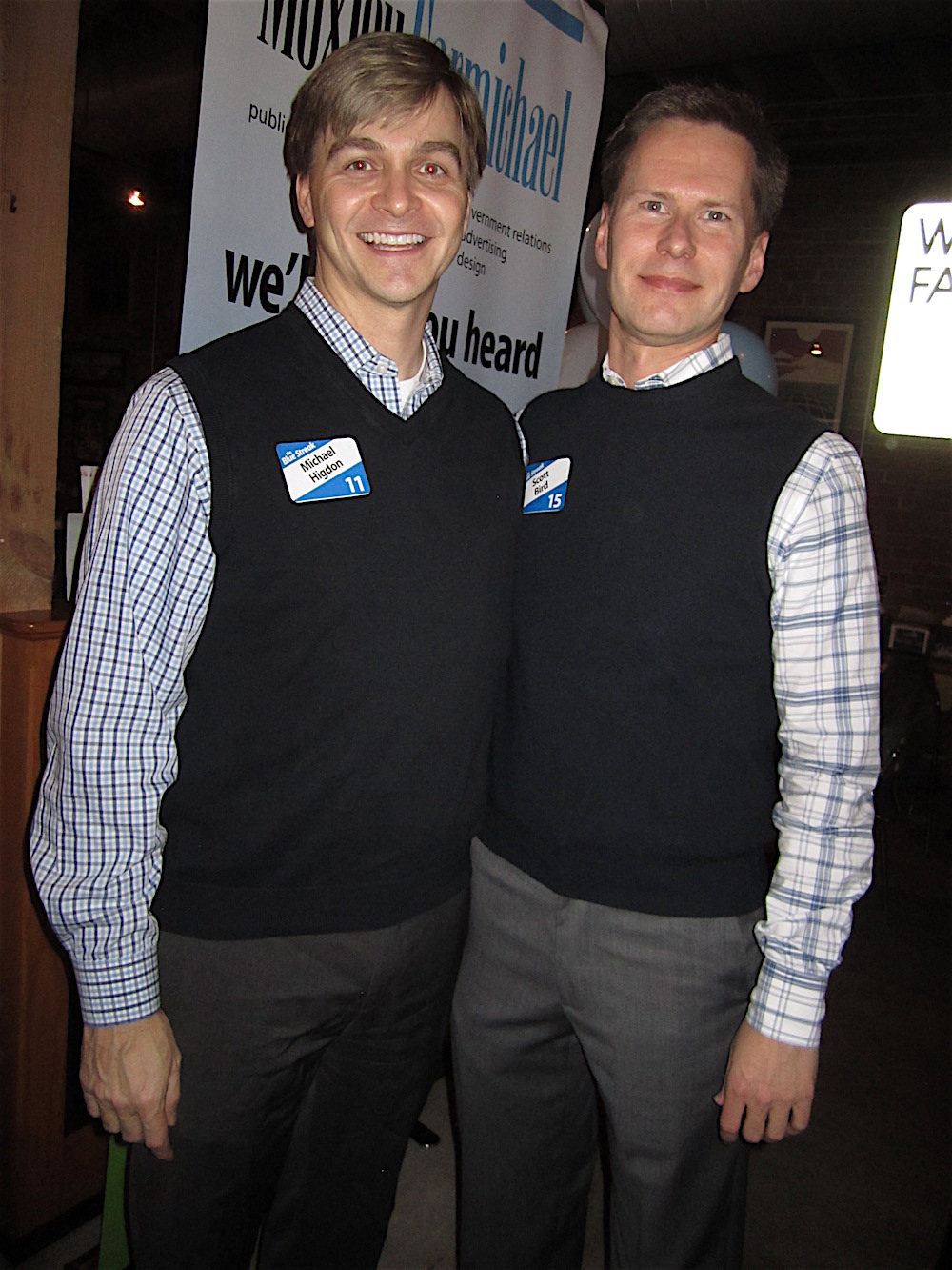 Michael Higdon, left, with Moxley Carmichael VP Scott Bird.