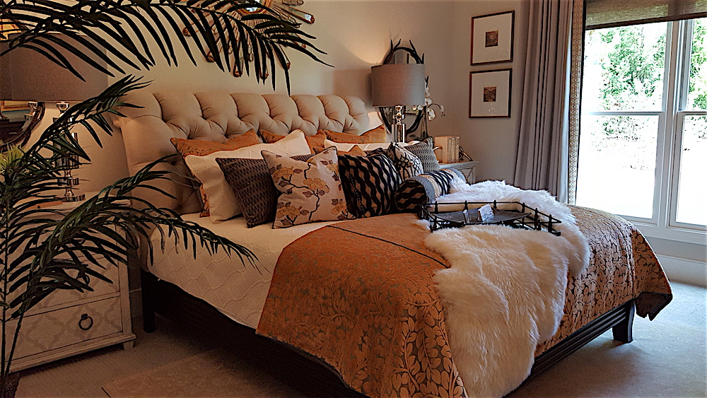 The master bedroom on the ground floor is by Michelle Vittetoe, David Storie and Anni Koch at Braden's Lifestyles at Turkey Creek.
