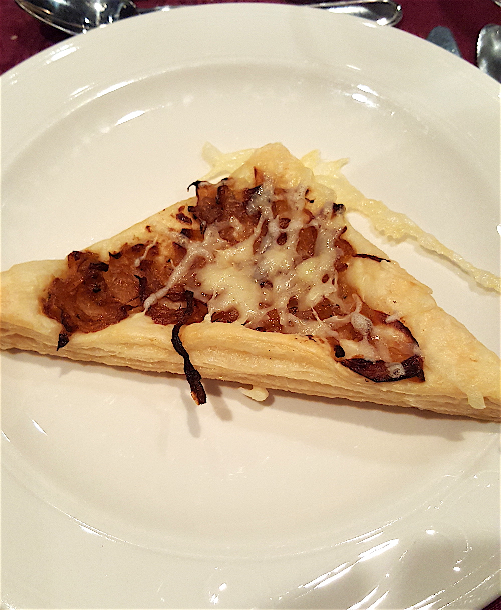 Appetizers were caramelized onion and Gruyere tarts. Light.