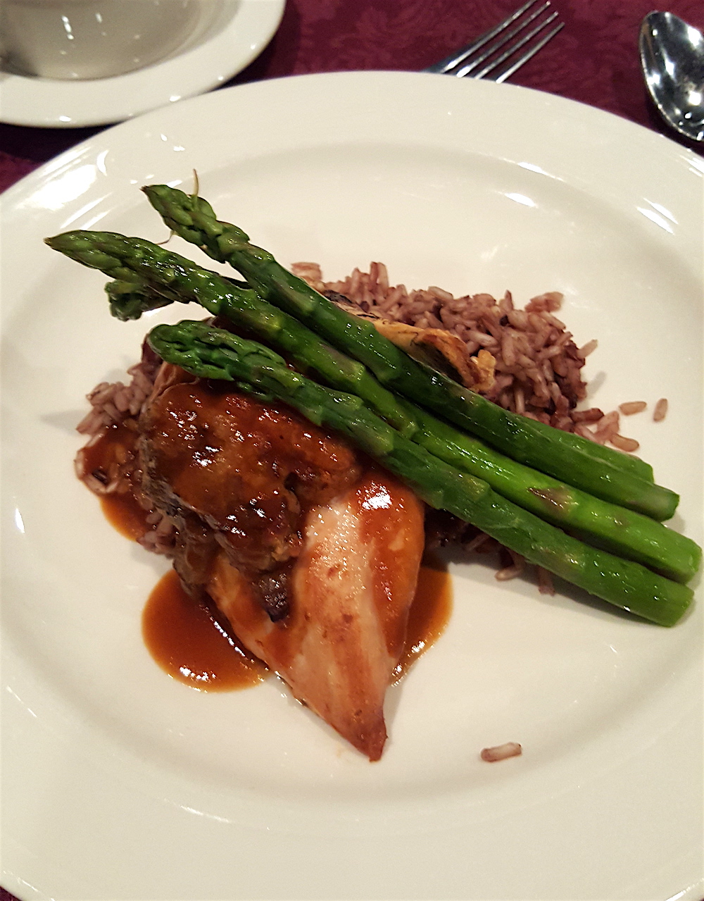 Alan ordered wild mushroom chicken breast stuffed with goat cheese with a roasted shallot demi-glaze.