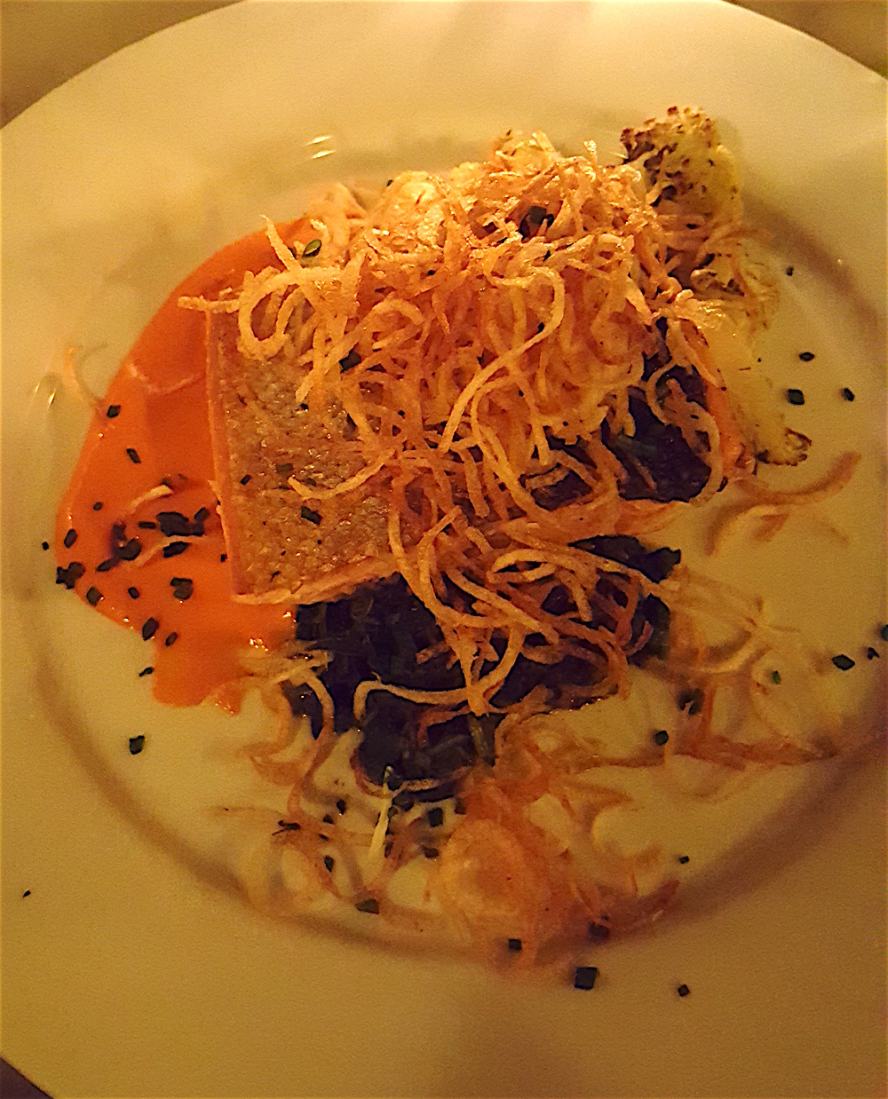 I adored my wild Coho salmon served with herbed cauliflower, sauteed spinach, shoestring potatoes and red pepper coulis.