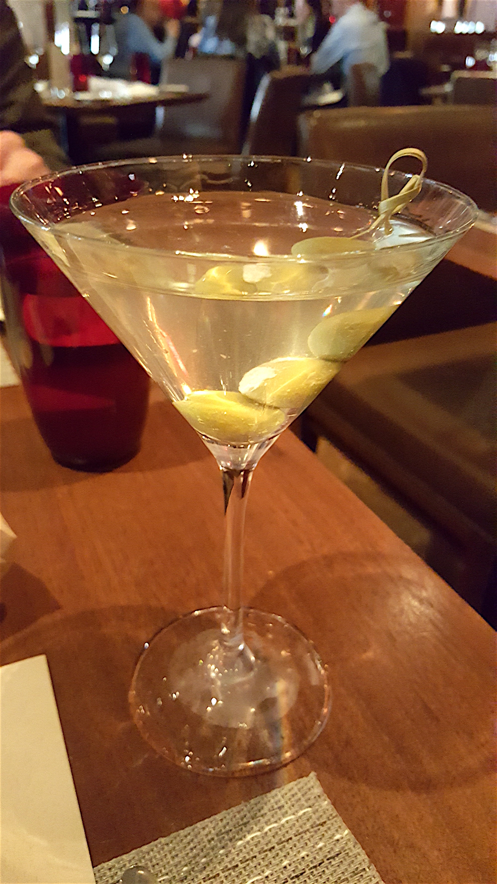My first order of business. Vodka martini, dirty, up, with blue cheese olives. Yes, please.