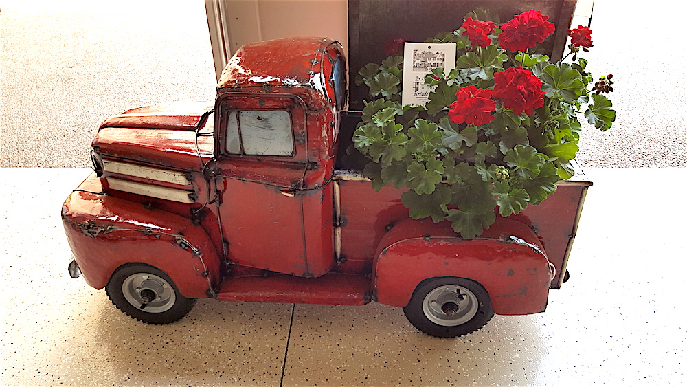 This pickup truck is in the cafe. It can be a cooler or a planter. Isn't it great? From Sweet Pea Garden Gifts in Bearden.