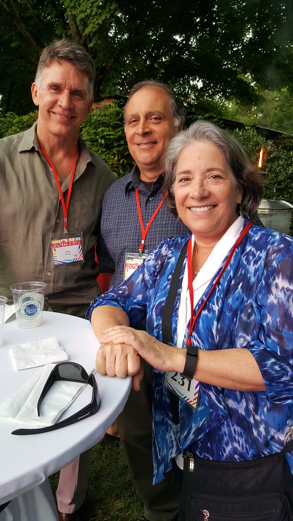 Mayor Madeline Rogero with her husband, Gene Monaco, center, and John Sherrill.