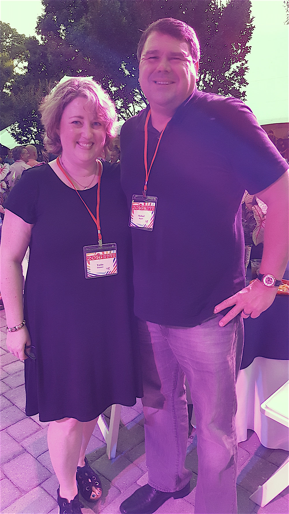 As it started to get dark, some pink lights came on. Here are Tasha Blakney and Michael Rodgers.