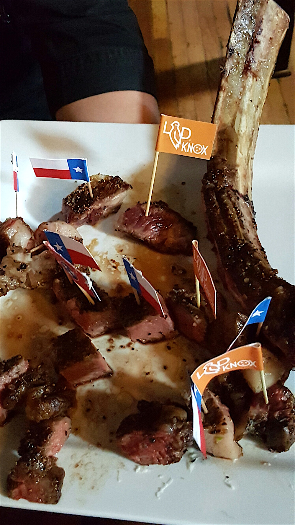 This is a tomahowk ribeye -- cut into bite-sized pieces. It appears on the menu -- in one piece -- for a price of $115. It will, no doubt, serve more than one person.