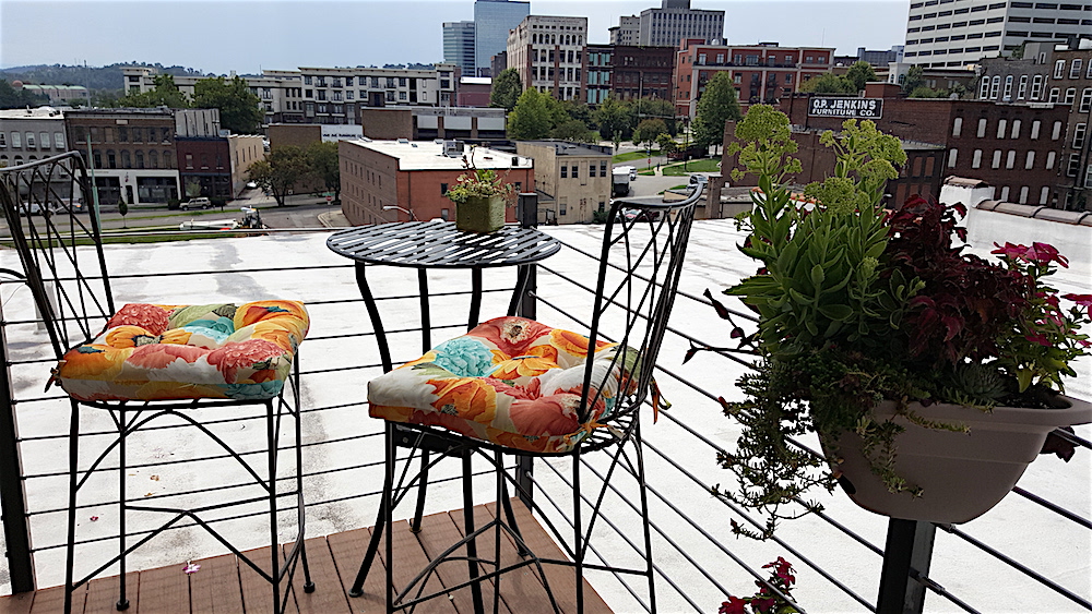 She has a sweet little balcony on her top floor, accessible by a spiral staircase.