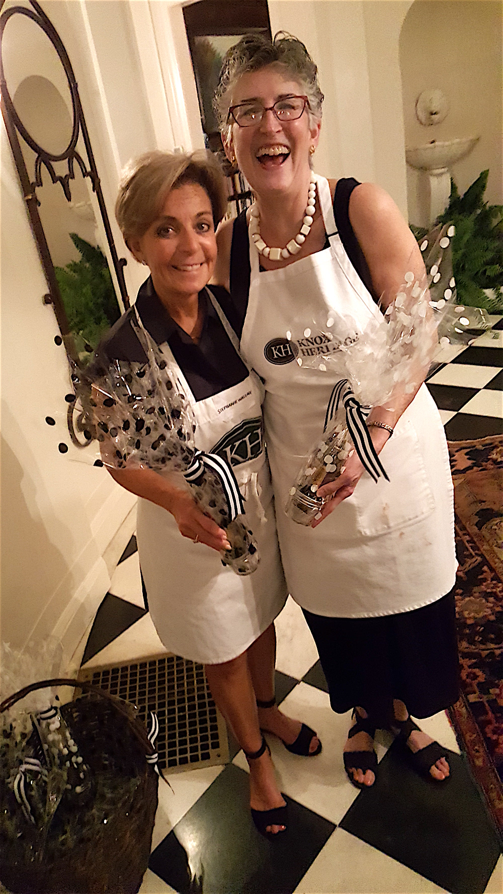 Unbelievably, as we left Stephanie Wallace, left, and Ellen Bebb handed us still more food and drink! In those pretty packages were little jars of chocolate truffles and small bottles of champagne. Perfection.