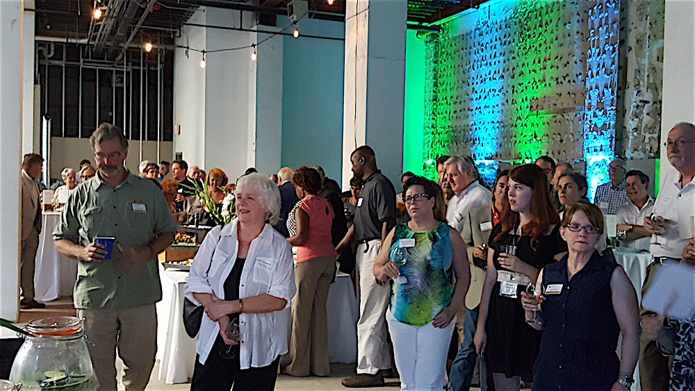 Folks were in a party mood, but they did pause to hear a few remarks.