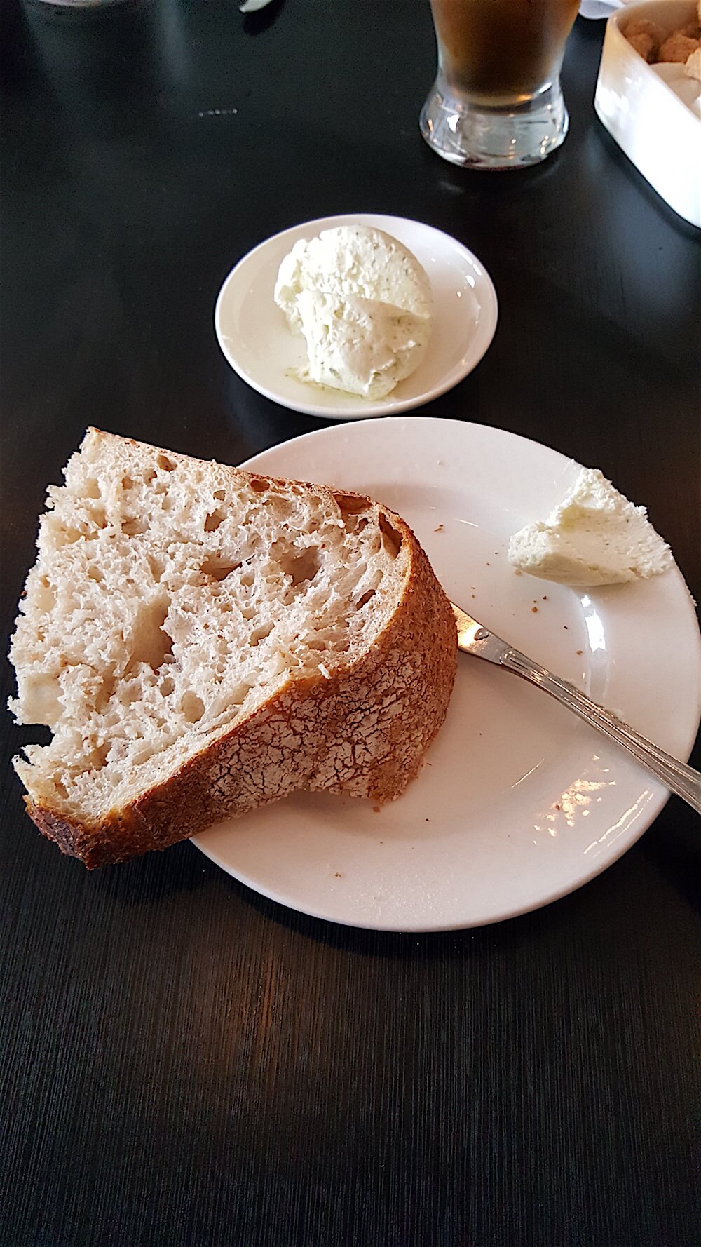 Even before that fantastic salad pictured at the top of this blog post, we knew we were in for a treat when the bread arrived. It was a slice of warm and crusty sourdough wheat bread. Very unusual but sharp and delicious.