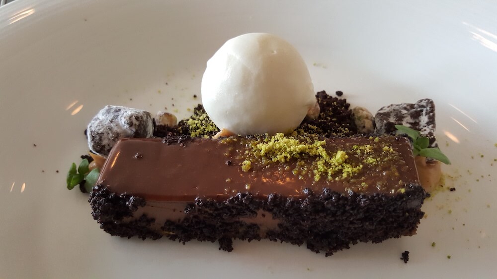 Even for a non-dessert fan like me, this was irresistible: chocolate pistachio mouse cake, lemon verbena sherbet and micro basil. Holy cow.