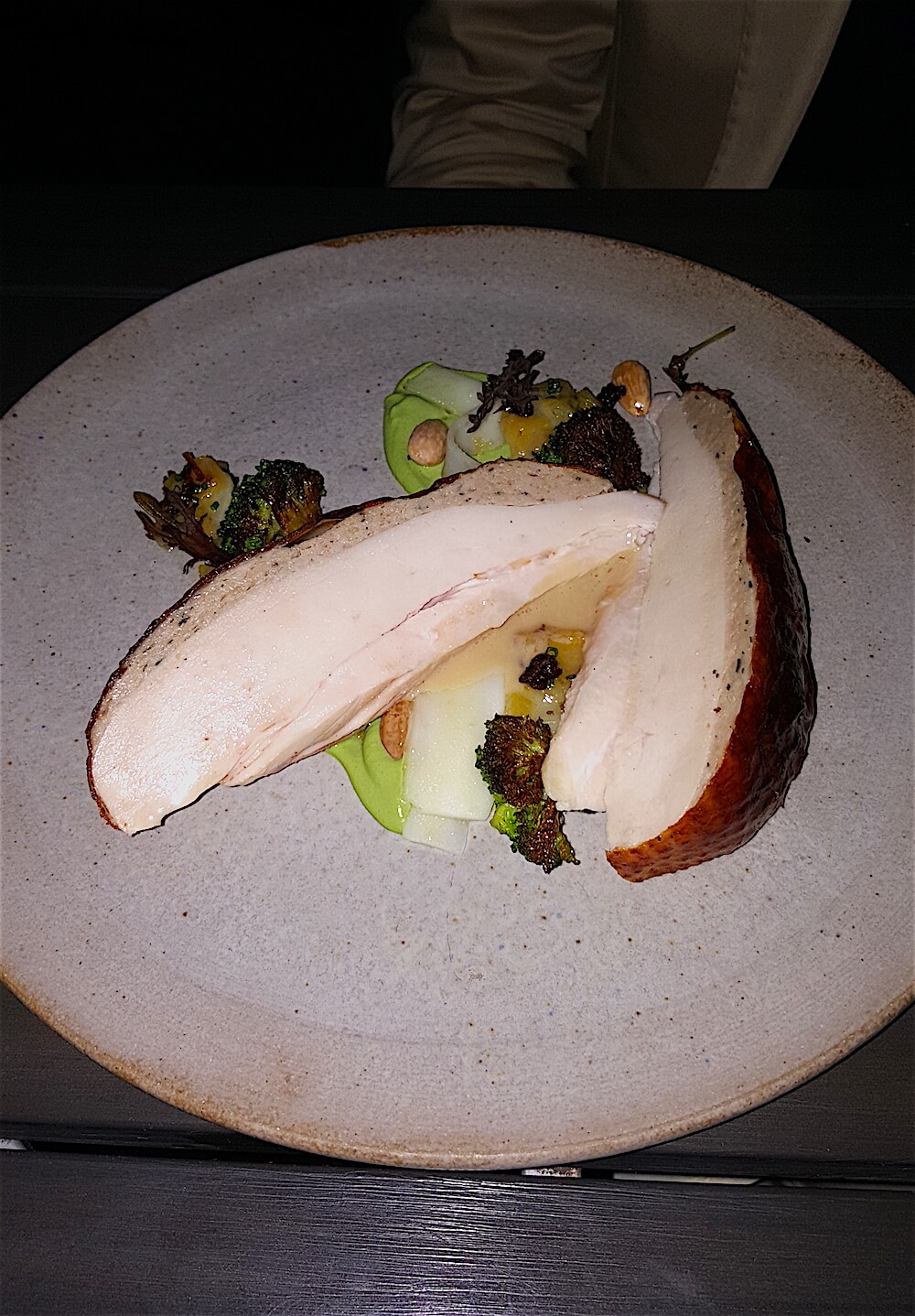 John didn't get a first course because his main course was huge! Here it is: roasted chicken with broccoli, almond and foie gras. Interestingly, the foie gras was inserted between the breast meat and the crispy skin.