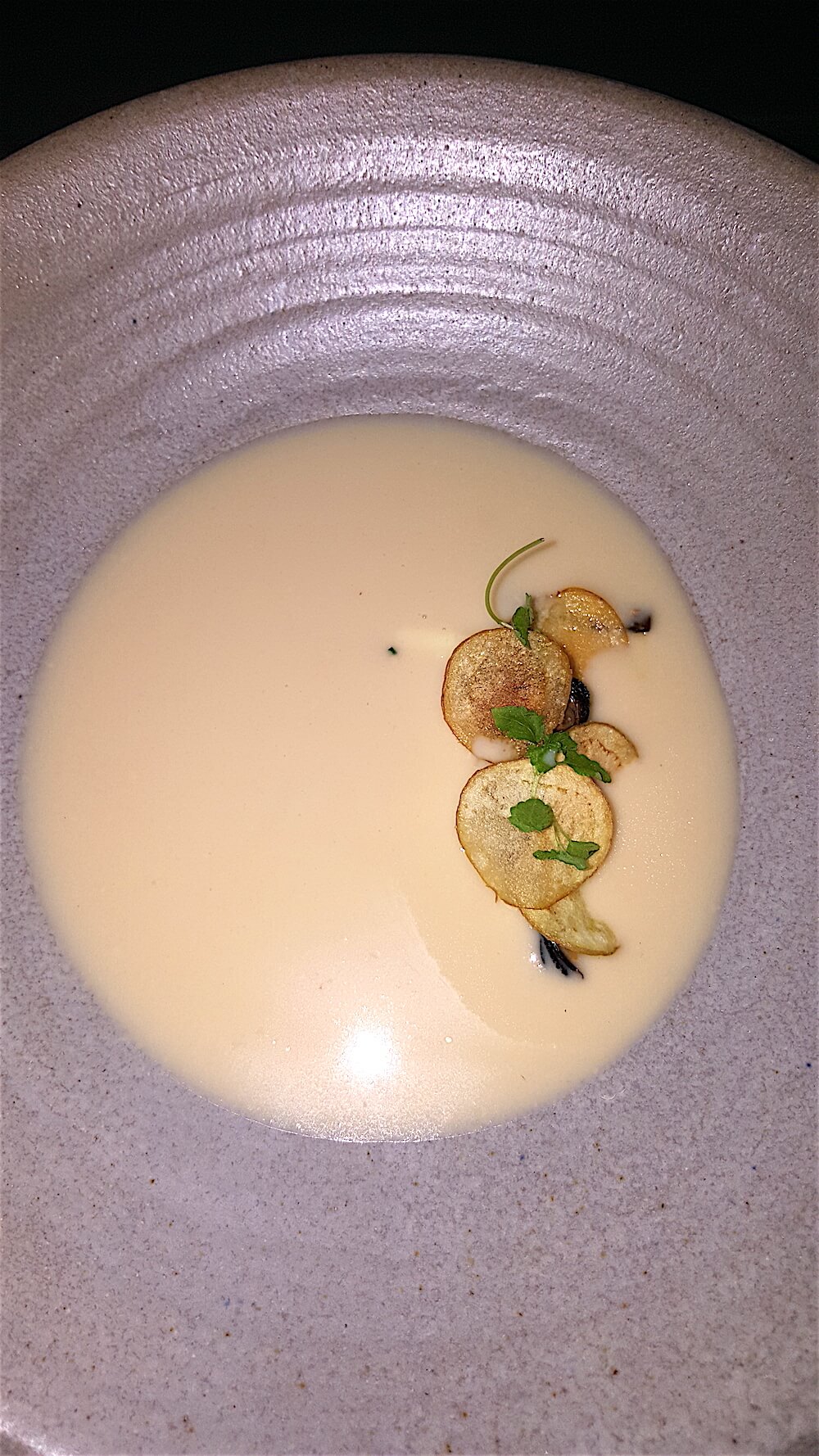 Mine didn't photograph very well, but it was fantastic. It was shellfish and apple chowder (how's that for seasonal?) poured over smoked mussels, peekytoe crab and kombu. Kombu is a kind of edible kelp. This was velvety smooth with a delightful little nugget of something interesting in every bite.