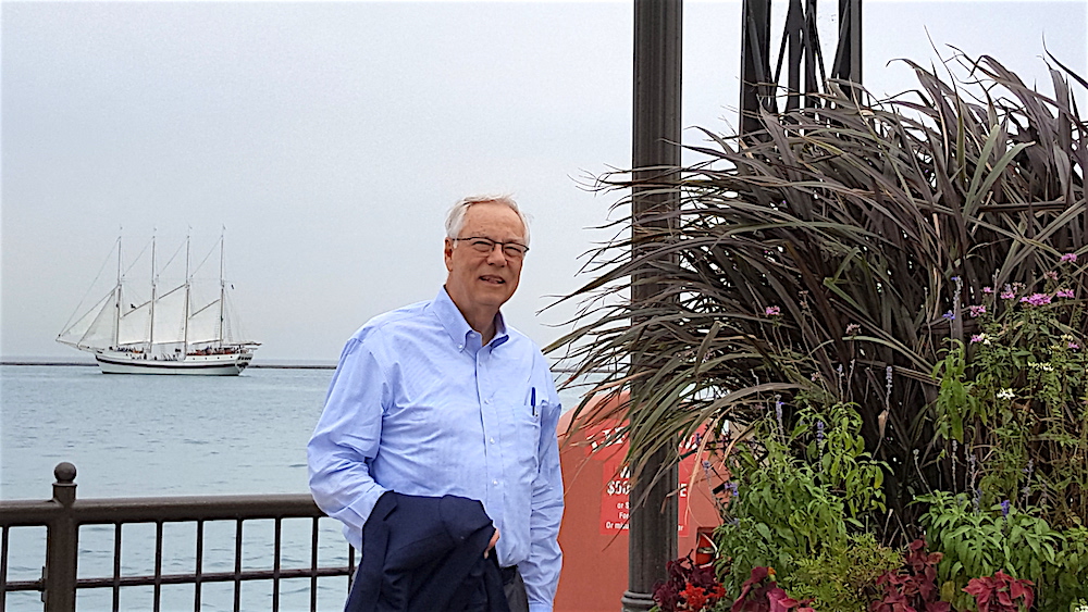 Here's Alan with a tall ship behind him.