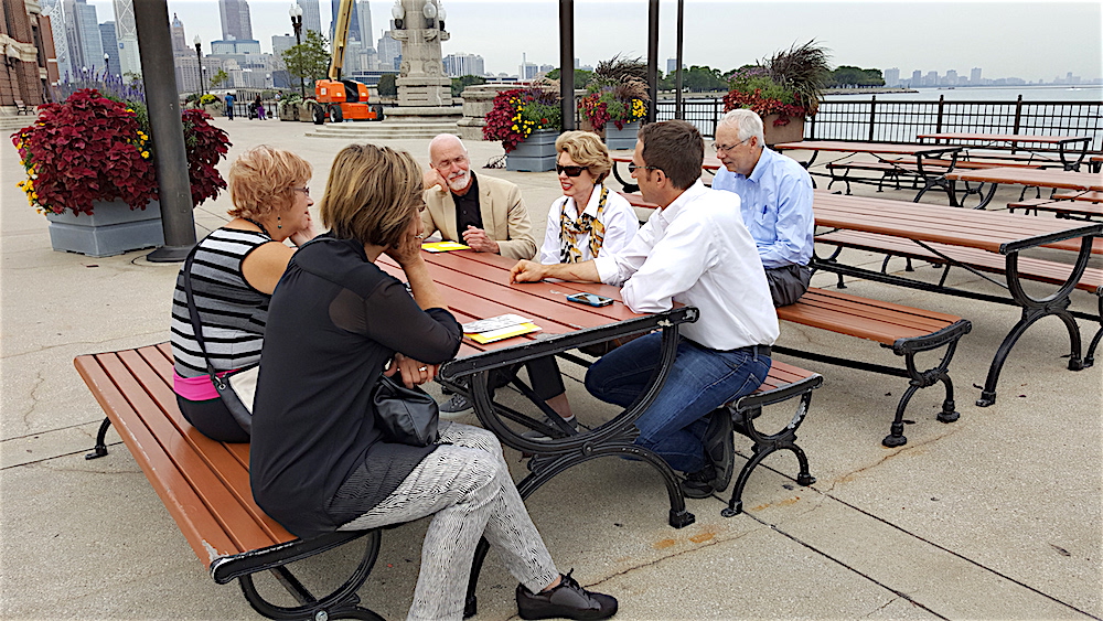 Killing time until Expo Chicago opens at noon. From left, Pandy Anderson, Lane Hays, John Cotham, Molly Joy, Stephen Wicks and Alan Carmichael.