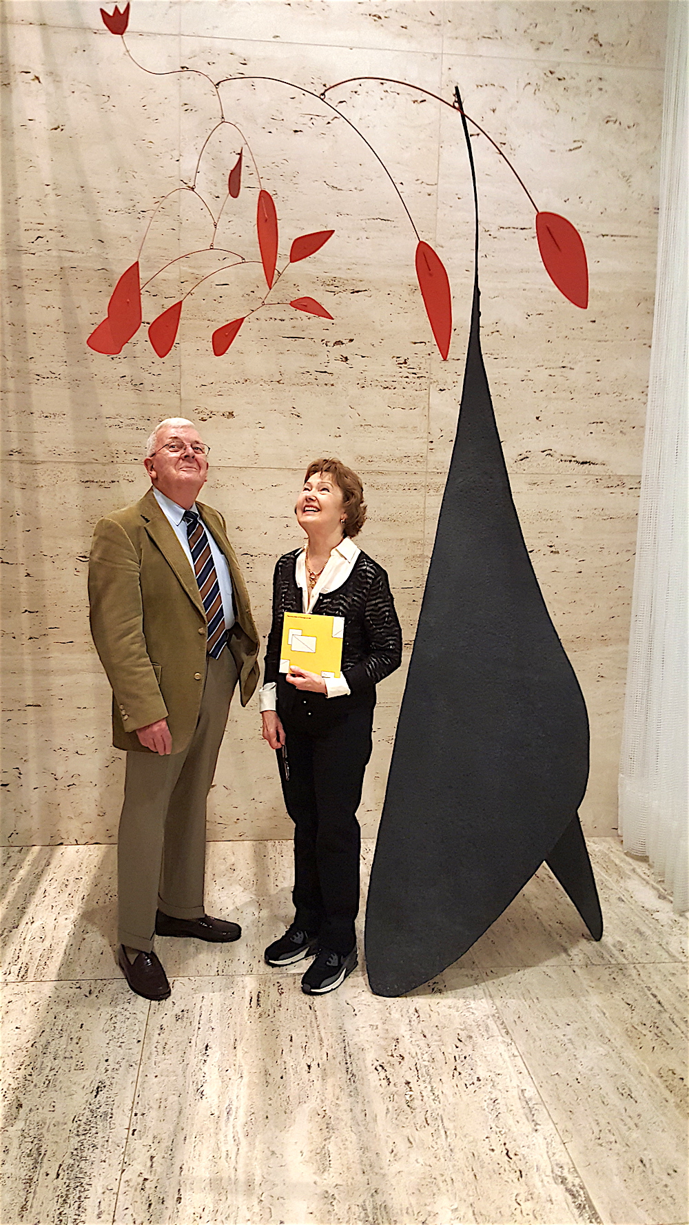 Terry and Donna Wertz admiring a sculpture by Alexander Calder, who was originator of the mobile.