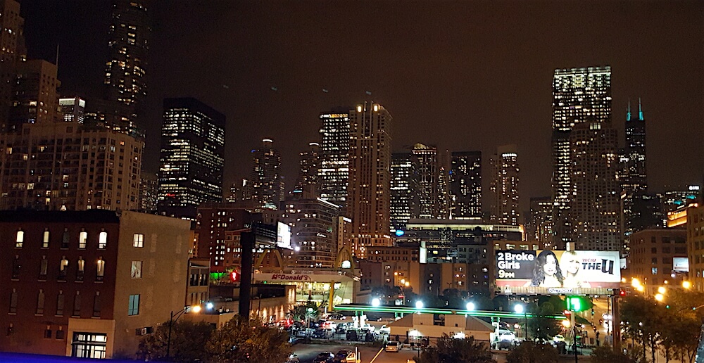 We stopped in the open rooftop bar when we got back to our hotel to take this picture of the Chicago skyline. But we didn't order anything because of our early schedule the next day.