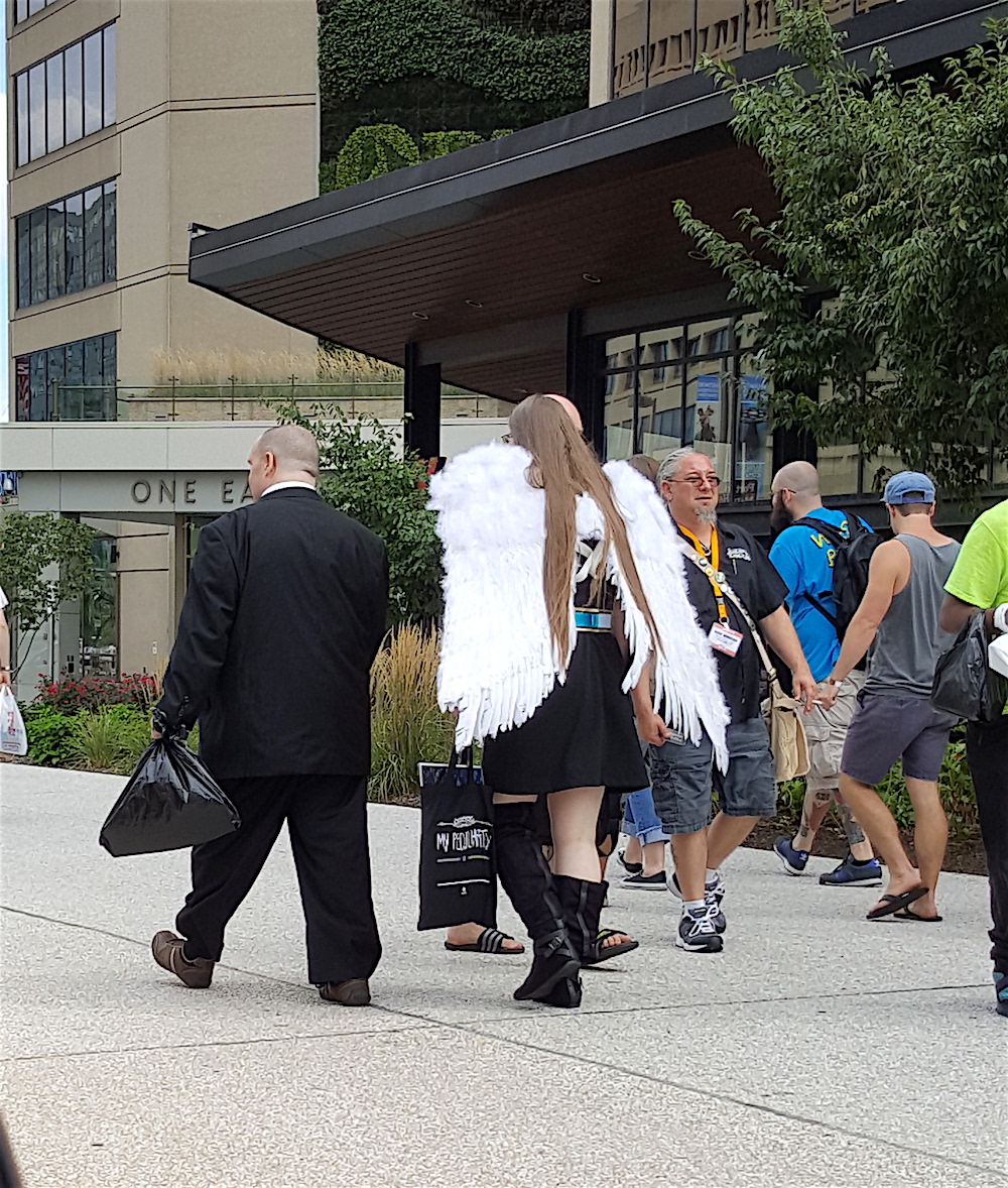 We knew that the Comic Con convention was in town, but it still surprised us to see this angel walking down the sidewalk!