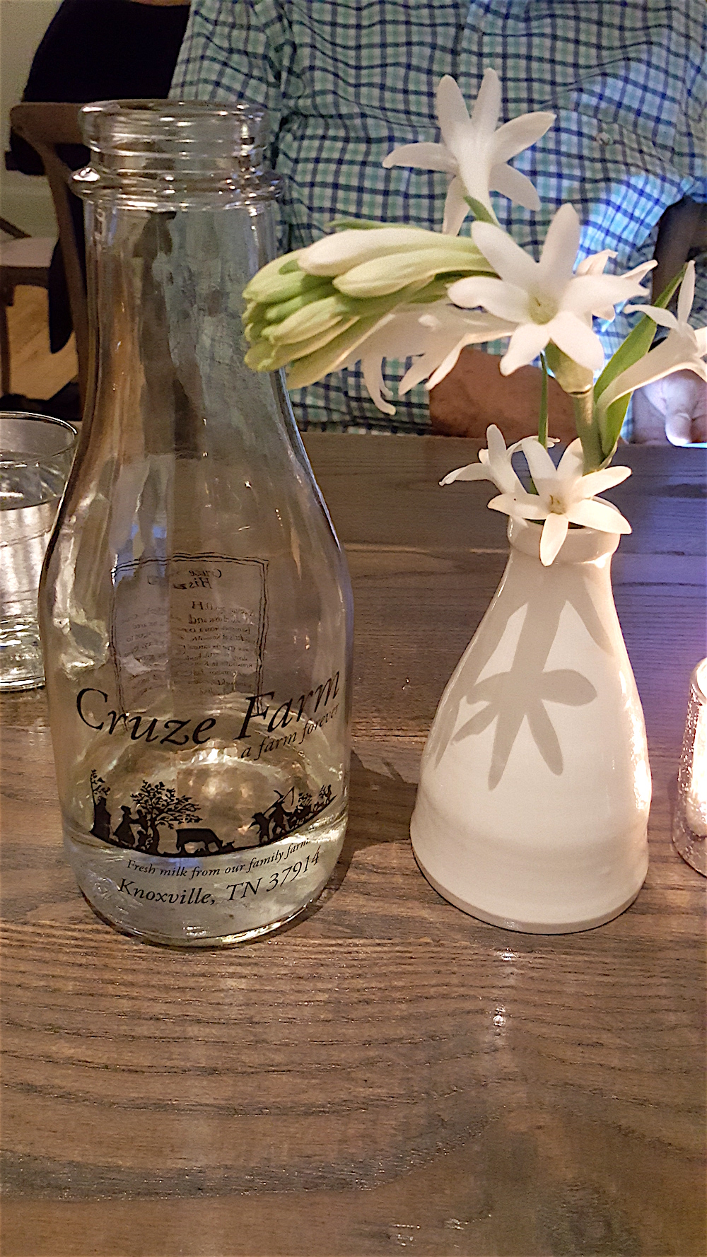 The centerpieces reminded me of Blackberry Farm, as well. Very simple little flowers. Also loved that the eatery uses Cruze Dairy Farm milk bottles as water bottles for every table.