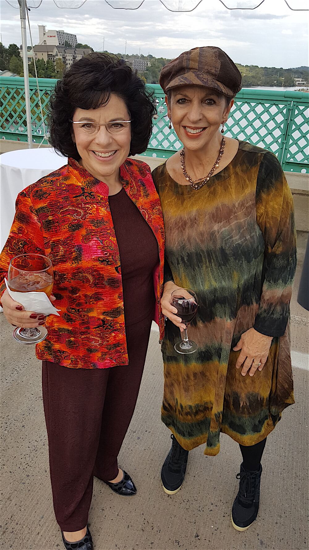 Liza Zenni, left, with her sister, Anne McKinney. Liza would speak later, saying, "We are looking over our beautiful city and the river that made it possible." I liked that.