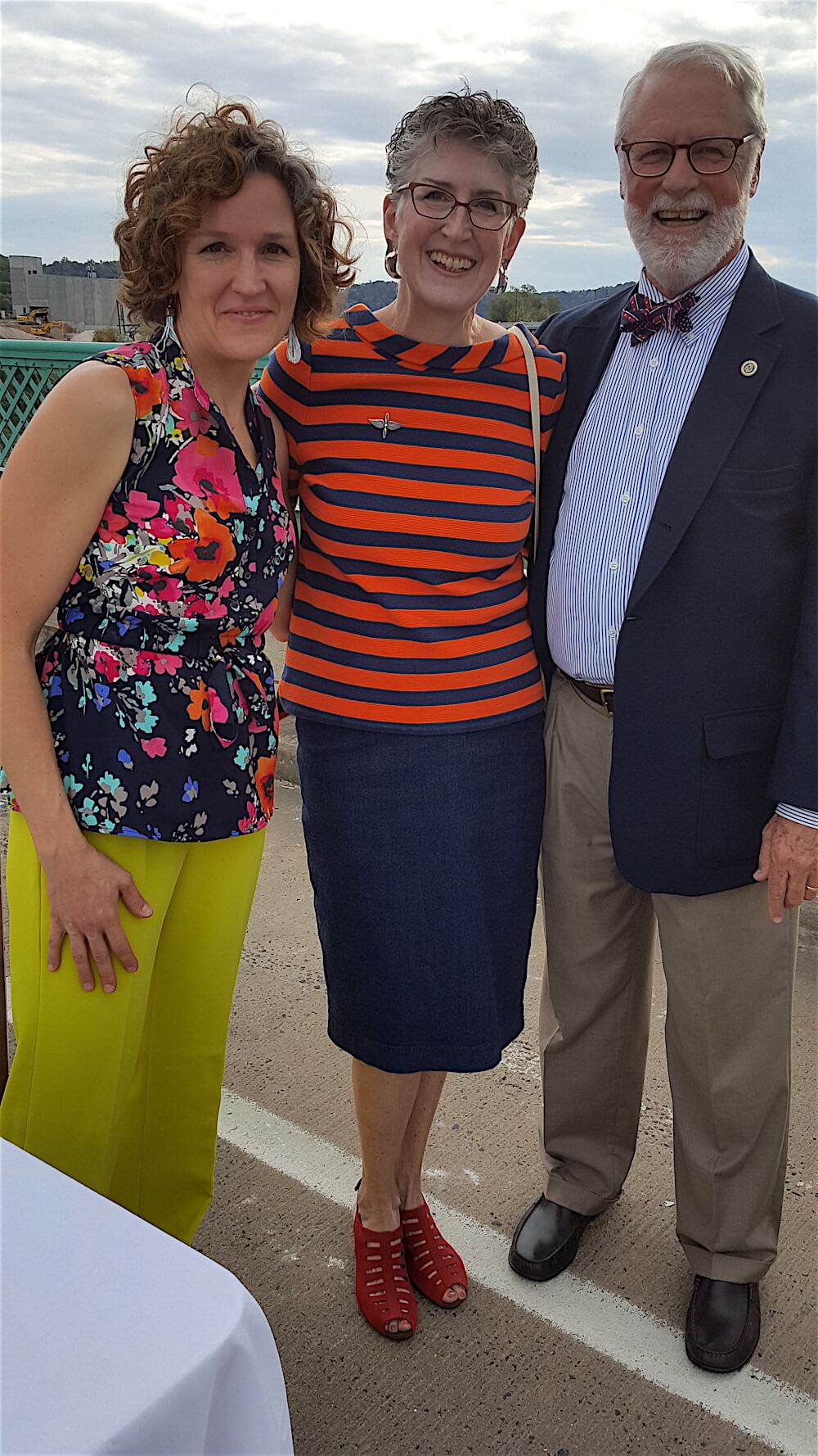 Suzanna Cada, left, of the Arts and Culture Alliance, chats with Knoxville City Councilman Finbarr Saunders and his wife, Ellen Bebb.