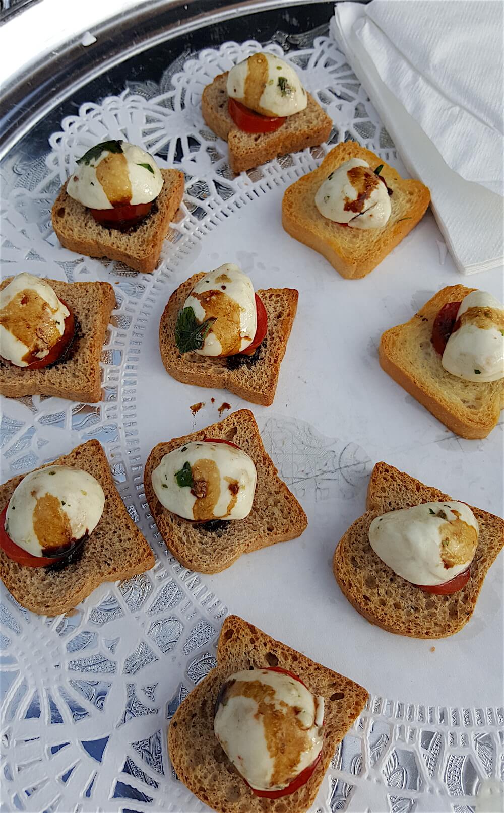 Buffalo bites. Mozzarella, tomato and balsamic drizzle.