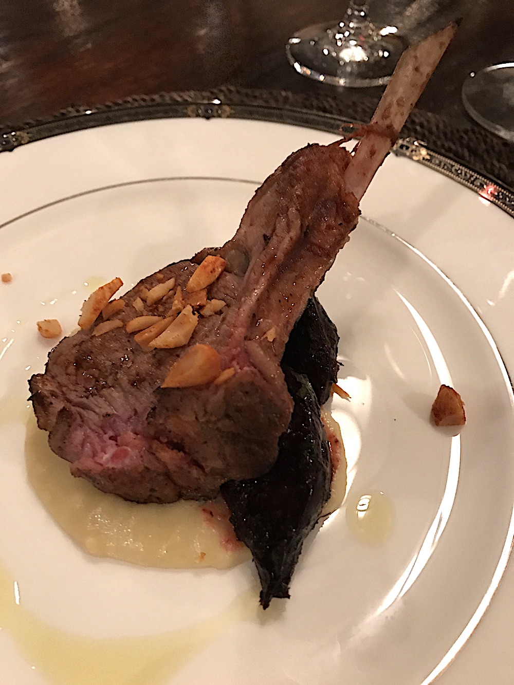 It was impossible to even contemplate eating this course because I was so full. I did taste it and it was very flavorful. Cast iron seared lamb loin chop with chickpea polenta, beets, salsa verde and Marcona almonds with pimenton. Pimenton is a kind of paprika.