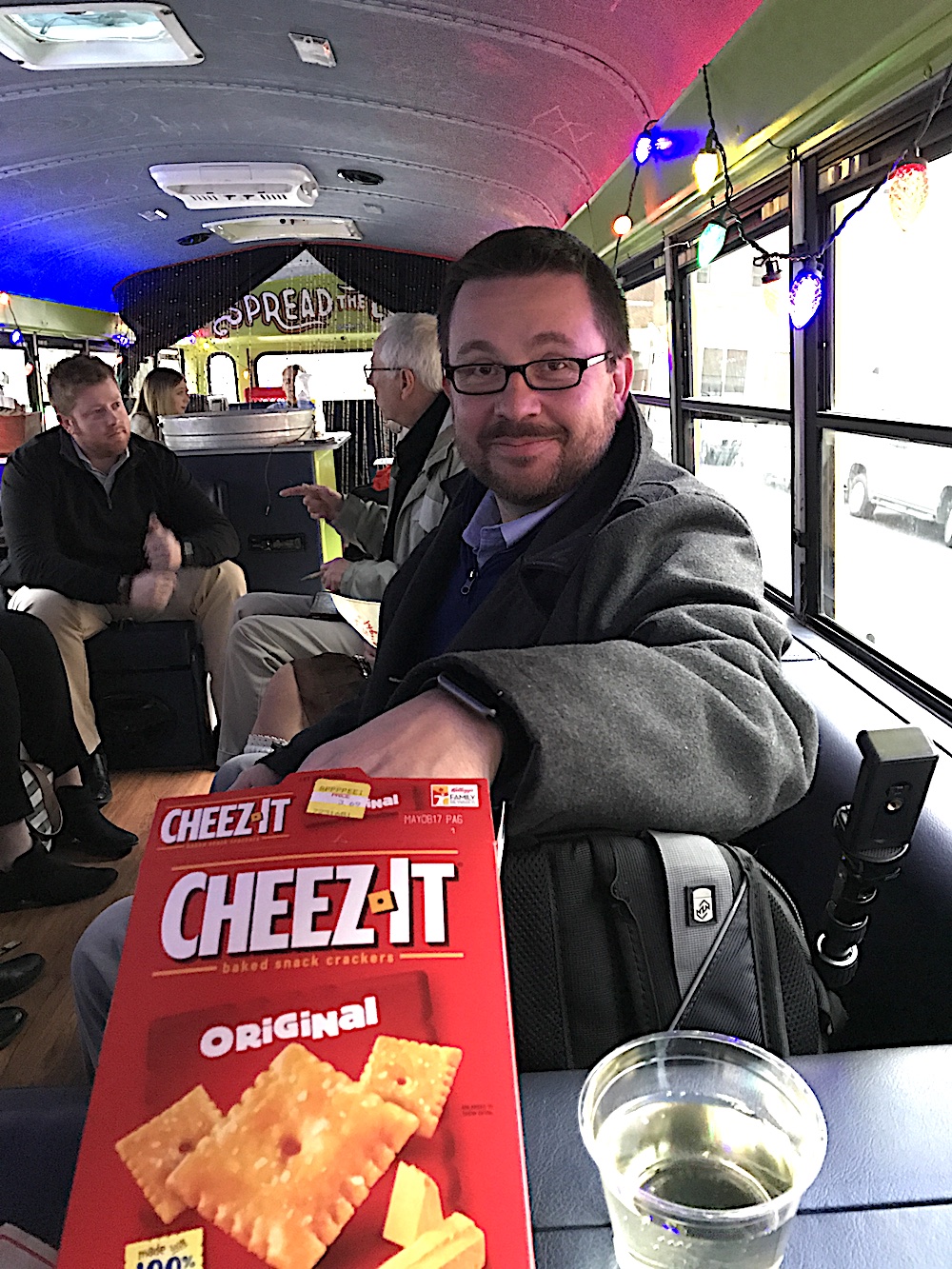 Our design director, Charley Sexton, digs into some of the delicious hors d'oeuvres on the bus! Ha.