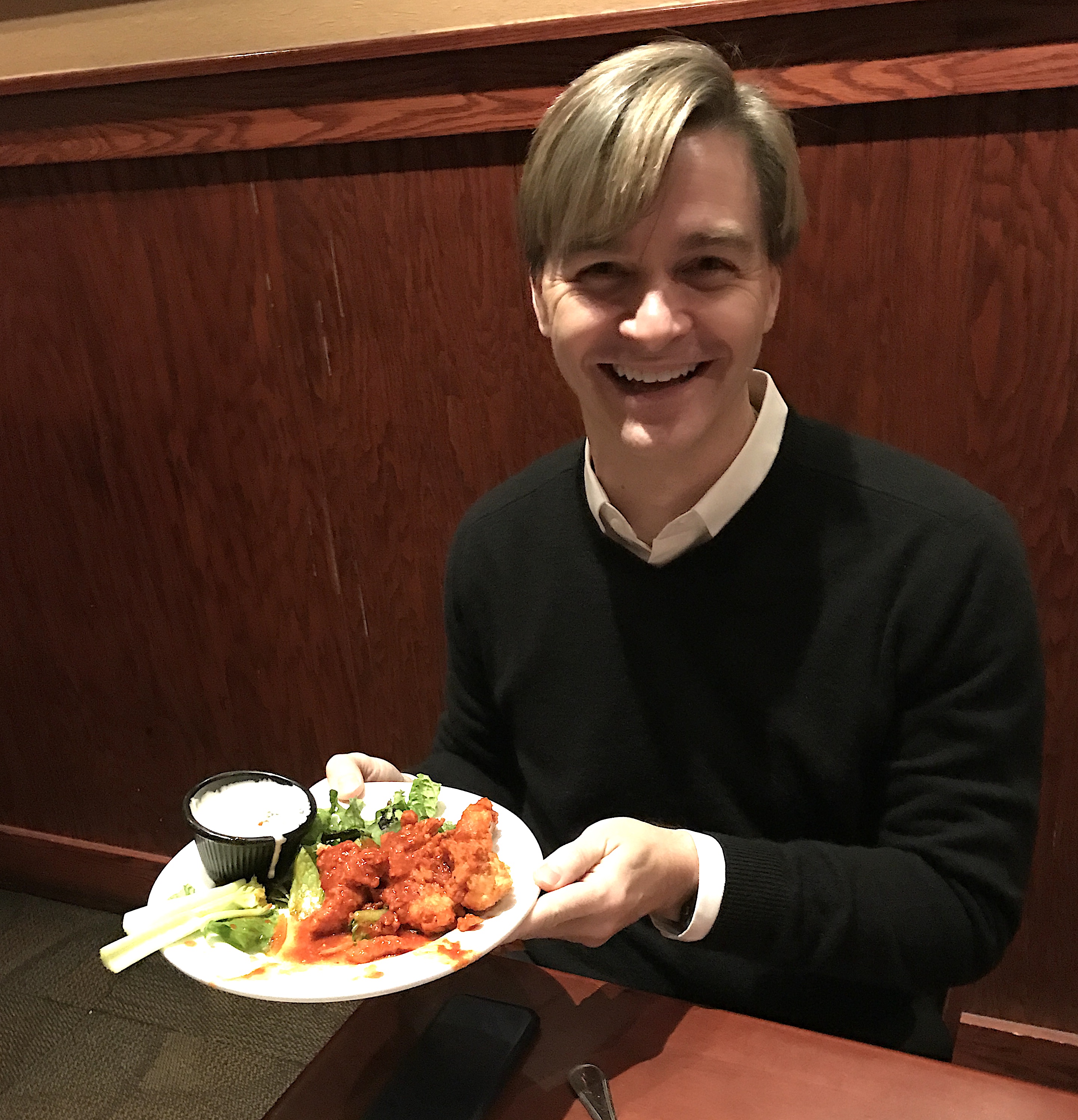 Michael passing the buffalo chicken tenders.
