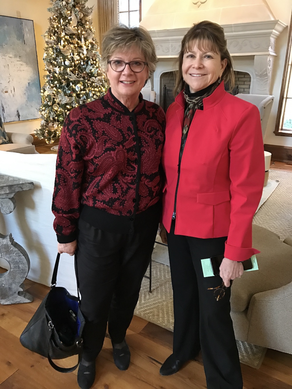 Sara Rose, left, visiting with Maribel Koella.
